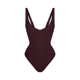 SKIMS BODY UNLINED PLUNGE THONG BODYSUIT | CURRANT